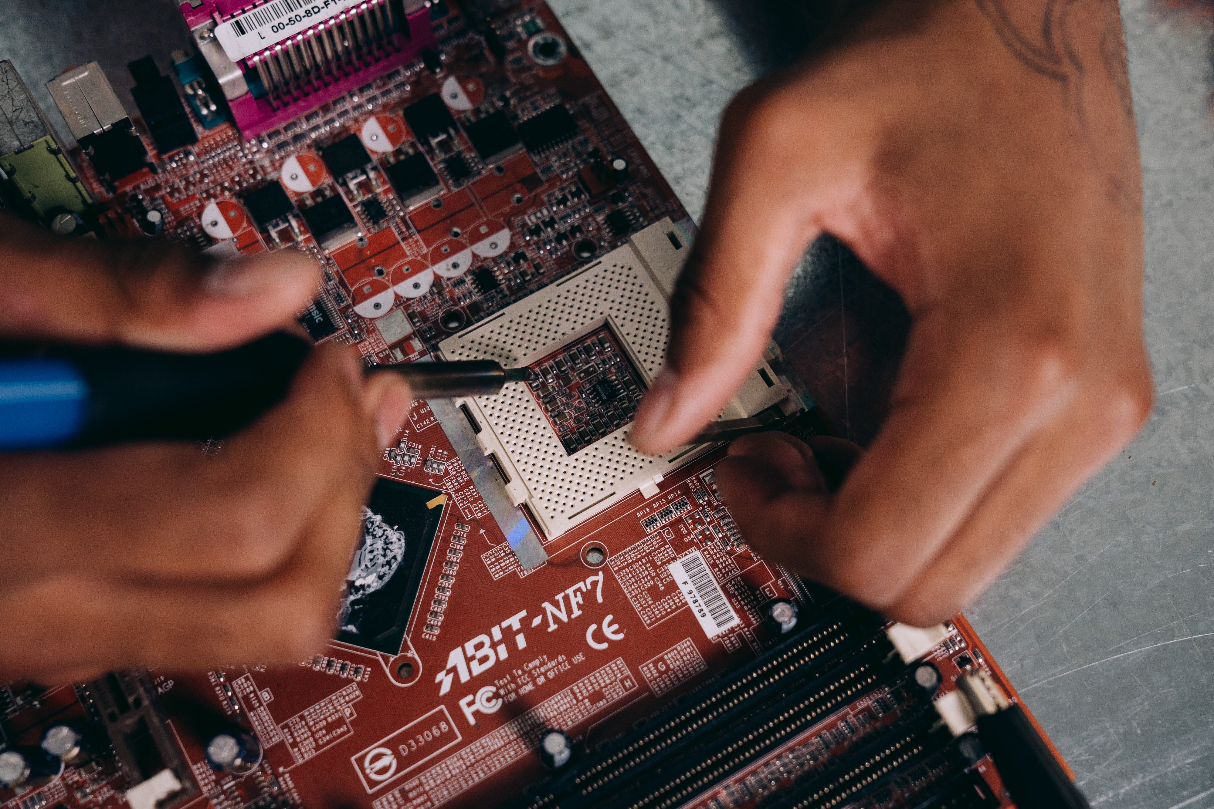 a man working on a motherboard